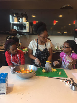 Volunteering as a supervisor at a children’s cooking cub